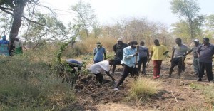 Community members working on the dam wall.