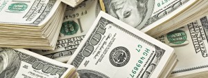 Many  bundle of US 100 dollars bank notes