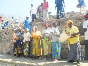 Women taking part in the weir construction.