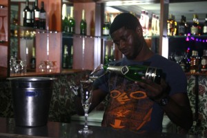  Champagne being served in a bar on McCarthy Street in Lagos. Reuters/Akintunde Akinleye 