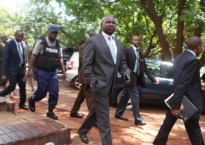 Tables turned ... Prosecutor General Johannes Tomana (centre) taken to court Tuesday