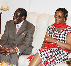 Managing the end ... President Mugabe and wife Grace