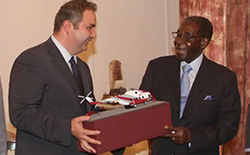 Georgy Kalamanov with President Robert Mugabe in Harare last October