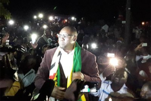 Evan Mawarire addresses people outside court