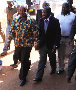 Walking tall ... Harare maor Bernard Manyenyeni (in floral shirt) at the courts last week