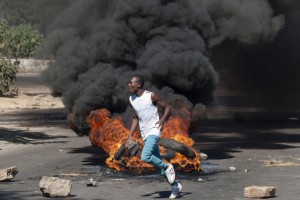 A man in Bulawayo where protesters have clashed with police (Picture: Getty)