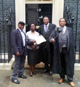 From left to right Dereck Tafuma , Pythias Makonese , Delina Tafadzwa Mutyambizi and Elliot Pfebve with the petition to be handed to the Prime Minister.