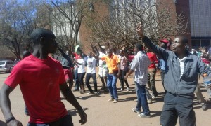 Defiant ... Youths singing on Friday