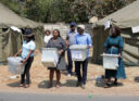  Zimbabwe Electoral Commission (ZEC) officials and polling agents carry ballot boxes of presidential, parliamentary and councilors elections from a polling station to a command center in Harare, Zimbabwe, 24 August 2023. President Emmerson Mnangagwa issued a decree late on 23 August to extend voting for another day at some polling centers, while other polling stations began the counting of ballots of the 2023 Zimbabwean general election to elect a president, members of parliament and councilors. EPA-EFE/AARON UFUMELI